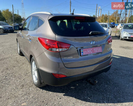 Коричневый Хендай их35, объемом двигателя 2 л и пробегом 184 тыс. км за 16450 $, фото 67 на Automoto.ua