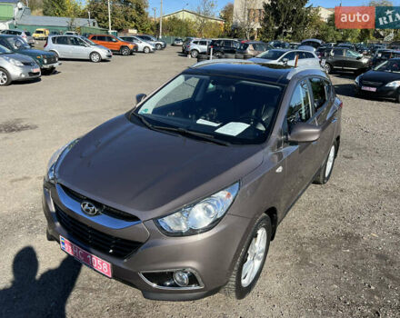 Коричневый Хендай их35, объемом двигателя 2 л и пробегом 184 тыс. км за 16450 $, фото 6 на Automoto.ua