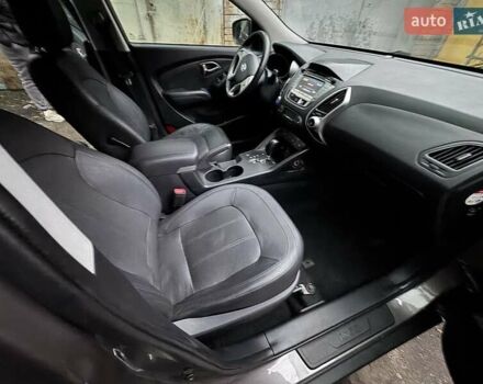 Коричневий Хендай іх35, об'ємом двигуна 2 л та пробігом 226 тис. км за 11500 $, фото 7 на Automoto.ua