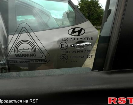 Коричневий Хендай іх35, об'ємом двигуна 2 л та пробігом 301 тис. км за 13500 $, фото 4 на Automoto.ua