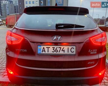 Коричневий Хендай іх35, об'ємом двигуна 2 л та пробігом 176 тис. км за 13700 $, фото 10 на Automoto.ua