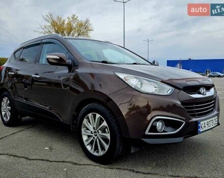 Коричневый Хендай их35, объемом двигателя 2 л и пробегом 146 тыс. км за 13300 $, фото 5 на Automoto.ua