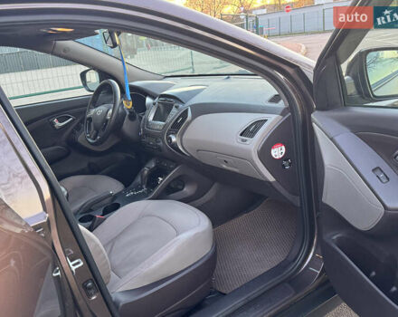 Коричневий Хендай іх35, об'ємом двигуна 2 л та пробігом 176 тис. км за 14500 $, фото 26 на Automoto.ua