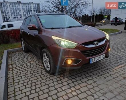 Коричневий Хендай іх35, об'ємом двигуна 2 л та пробігом 176 тис. км за 13700 $, фото 3 на Automoto.ua