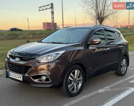 Коричневий Хендай іх35, об'ємом двигуна 2 л та пробігом 176 тис. км за 14500 $, фото 22 на Automoto.ua