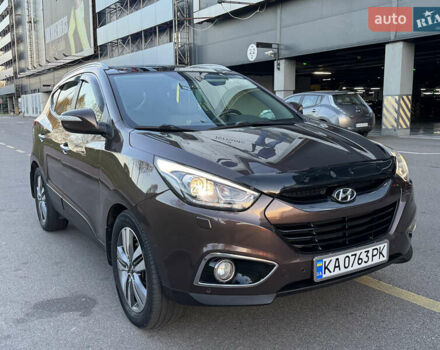 Коричневий Хендай іх35, об'ємом двигуна 2 л та пробігом 176 тис. км за 14500 $, фото 67 на Automoto.ua
