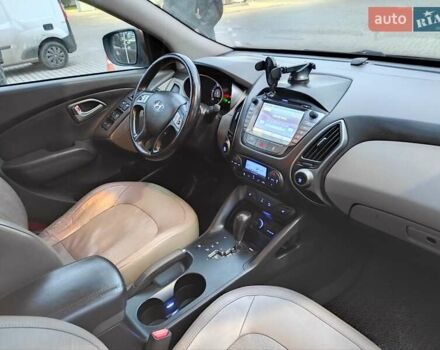 Коричневий Хендай іх35, об'ємом двигуна 2 л та пробігом 176 тис. км за 13700 $, фото 16 на Automoto.ua