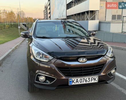 Коричневий Хендай іх35, об'ємом двигуна 2 л та пробігом 176 тис. км за 14500 $, фото 18 на Automoto.ua