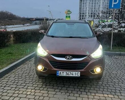 Коричневий Хендай іх35, об'ємом двигуна 2 л та пробігом 176 тис. км за 13700 $, фото 11 на Automoto.ua