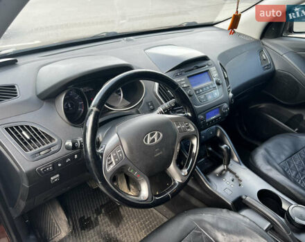 Коричневый Хендай их35, объемом двигателя 2 л и пробегом 132 тыс. км за 13500 $, фото 7 на Automoto.ua