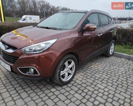 Коричневий Хендай іх35, об'ємом двигуна 2 л та пробігом 176 тис. км за 13700 $, фото 5 на Automoto.ua