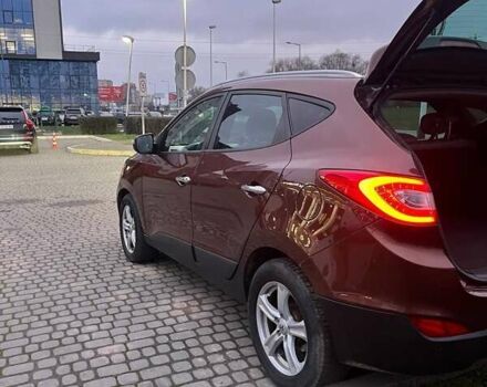 Коричневий Хендай іх35, об'ємом двигуна 2 л та пробігом 176 тис. км за 13700 $, фото 8 на Automoto.ua