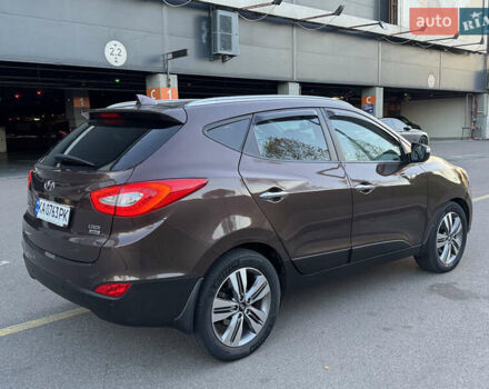 Коричневий Хендай іх35, об'ємом двигуна 2 л та пробігом 176 тис. км за 14500 $, фото 70 на Automoto.ua