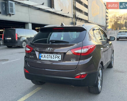 Коричневий Хендай іх35, об'ємом двигуна 2 л та пробігом 176 тис. км за 14500 $, фото 74 на Automoto.ua