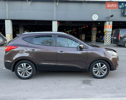 Коричневий Хендай іх35, об'ємом двигуна 2 л та пробігом 176 тис. км за 14500 $, фото 71 на Automoto.ua