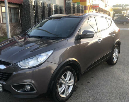 Коричневий Хендай іх35, об'ємом двигуна 2 л та пробігом 191 тис. км за 12500 $, фото 12 на Automoto.ua