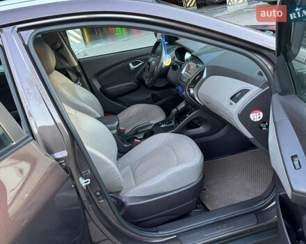 Коричневий Хендай іх35, об'ємом двигуна 2 л та пробігом 176 тис. км за 14500 $, фото 60 на Automoto.ua