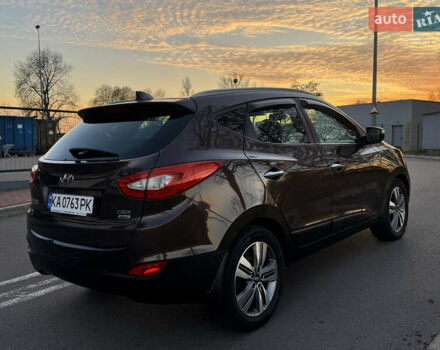 Коричневий Хендай іх35, об'ємом двигуна 2 л та пробігом 176 тис. км за 14500 $, фото 13 на Automoto.ua