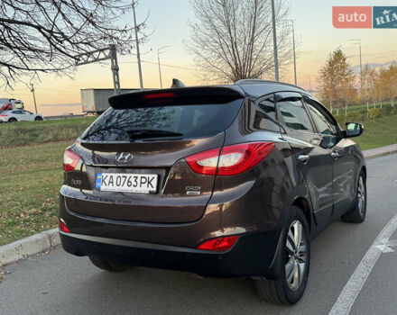 Коричневий Хендай іх35, об'ємом двигуна 2 л та пробігом 176 тис. км за 14500 $, фото 5 на Automoto.ua