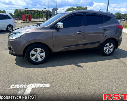 Коричневий Хендай іх35, об'ємом двигуна 1.7 л та пробігом 206 тис. км за 12600 $, фото 7 на Automoto.ua