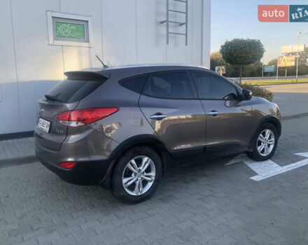 Коричневий Хендай іх35, об'ємом двигуна 2 л та пробігом 191 тис. км за 12500 $, фото 5 на Automoto.ua