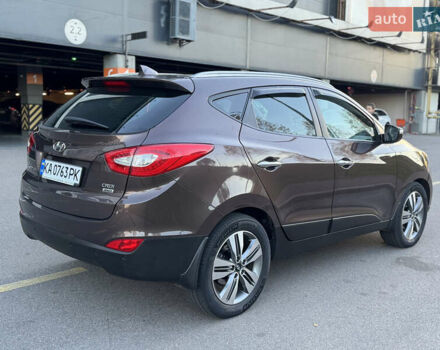 Коричневий Хендай іх35, об'ємом двигуна 2 л та пробігом 176 тис. км за 14500 $, фото 73 на Automoto.ua