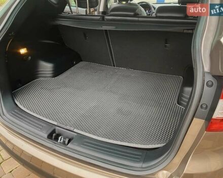 Коричневый Хендай их35, объемом двигателя 2 л и пробегом 63 тыс. км за 16000 $, фото 6 на Automoto.ua