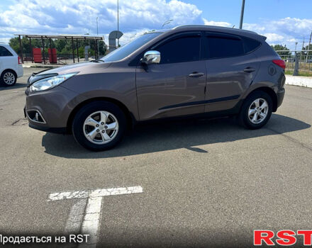 Коричневий Хендай іх35, об'ємом двигуна 1.7 л та пробігом 206 тис. км за 12600 $, фото 6 на Automoto.ua