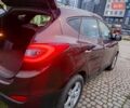 Коричневий Хендай іх35, об'ємом двигуна 2 л та пробігом 176 тис. км за 13700 $, фото 9 на Automoto.ua