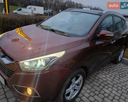 Коричневий Хендай іх35, об'ємом двигуна 2 л та пробігом 176 тис. км за 13700 $, фото 2 на Automoto.ua