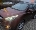 Коричневий Хендай іх35, об'ємом двигуна 2 л та пробігом 176 тис. км за 13700 $, фото 2 на Automoto.ua