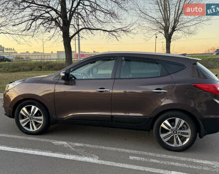 Коричневий Хендай іх35, об'ємом двигуна 2 л та пробігом 176 тис. км за 14500 $, фото 10 на Automoto.ua