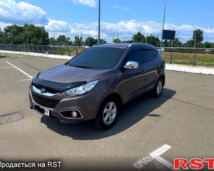 Коричневий Хендай іх35, об'ємом двигуна 1.7 л та пробігом 206 тис. км за 12600 $, фото 5 на Automoto.ua