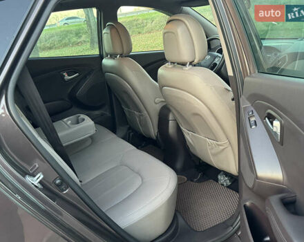 Коричневий Хендай іх35, об'ємом двигуна 2 л та пробігом 176 тис. км за 14500 $, фото 88 на Automoto.ua