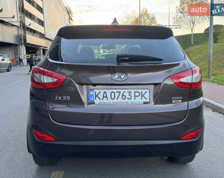 Коричневий Хендай іх35, об'ємом двигуна 2 л та пробігом 176 тис. км за 14500 $, фото 89 на Automoto.ua