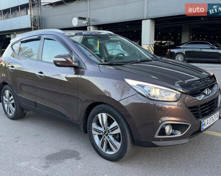 Коричневий Хендай іх35, об'ємом двигуна 2 л та пробігом 176 тис. км за 14500 $, фото 66 на Automoto.ua