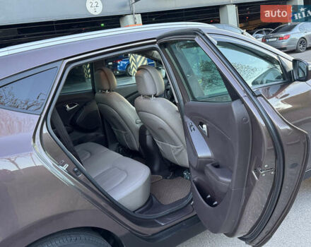 Коричневий Хендай іх35, об'ємом двигуна 2 л та пробігом 176 тис. км за 14500 $, фото 64 на Automoto.ua