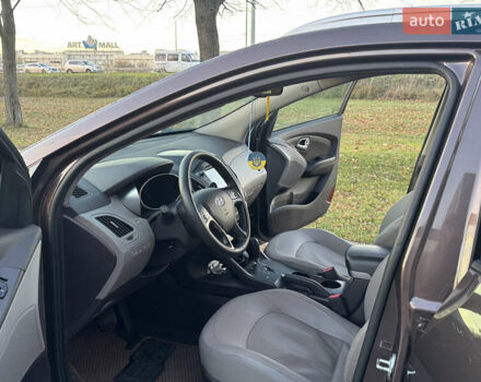 Коричневий Хендай іх35, об'ємом двигуна 2 л та пробігом 176 тис. км за 14500 $, фото 24 на Automoto.ua