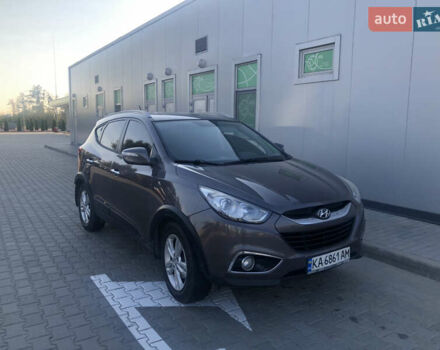 Коричневий Хендай іх35, об'ємом двигуна 2 л та пробігом 191 тис. км за 12500 $, фото 2 на Automoto.ua