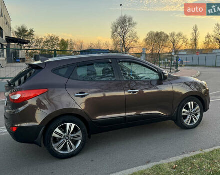 Коричневий Хендай іх35, об'ємом двигуна 2 л та пробігом 176 тис. км за 14500 $, фото 12 на Automoto.ua