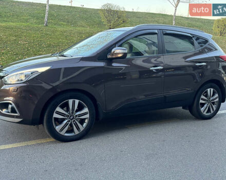 Коричневий Хендай іх35, об'ємом двигуна 2 л та пробігом 176 тис. км за 14500 $, фото 72 на Automoto.ua