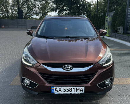 Коричневый Хендай их35, объемом двигателя 2 л и пробегом 132 тыс. км за 13500 $, фото 1 на Automoto.ua