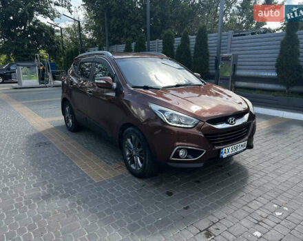 Коричневый Хендай их35, объемом двигателя 2 л и пробегом 132 тыс. км за 13500 $, фото 2 на Automoto.ua