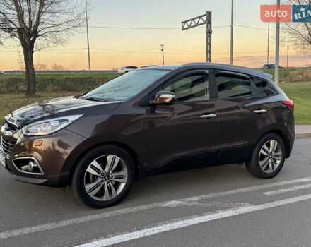 Коричневий Хендай іх35, об'ємом двигуна 2 л та пробігом 176 тис. км за 14500 $, фото 9 на Automoto.ua