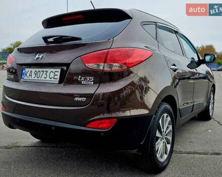 Коричневый Хендай их35, объемом двигателя 2 л и пробегом 146 тыс. км за 13300 $, фото 3 на Automoto.ua