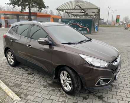 Коричневый Хендай их35, объемом двигателя 2 л и пробегом 185 тыс. км за 10615 $, фото 7 на Automoto.ua