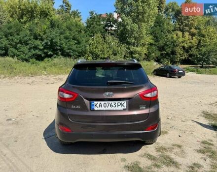 Коричневый Хендай их35, объемом двигателя 2 л и пробегом 175 тыс. км за 14970 $, фото 4 на Automoto.ua