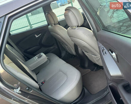 Коричневий Хендай іх35, об'ємом двигуна 2 л та пробігом 176 тис. км за 14500 $, фото 82 на Automoto.ua