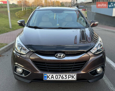 Коричневий Хендай іх35, об'ємом двигуна 2 л та пробігом 176 тис. км за 14500 $, фото 20 на Automoto.ua