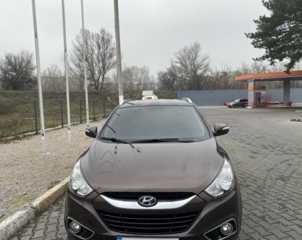 Коричневый Хендай их35, объемом двигателя 2 л и пробегом 185 тыс. км за 10615 $, фото 3 на Automoto.ua